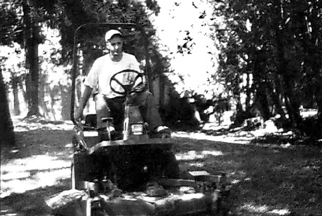 man on a riding mower