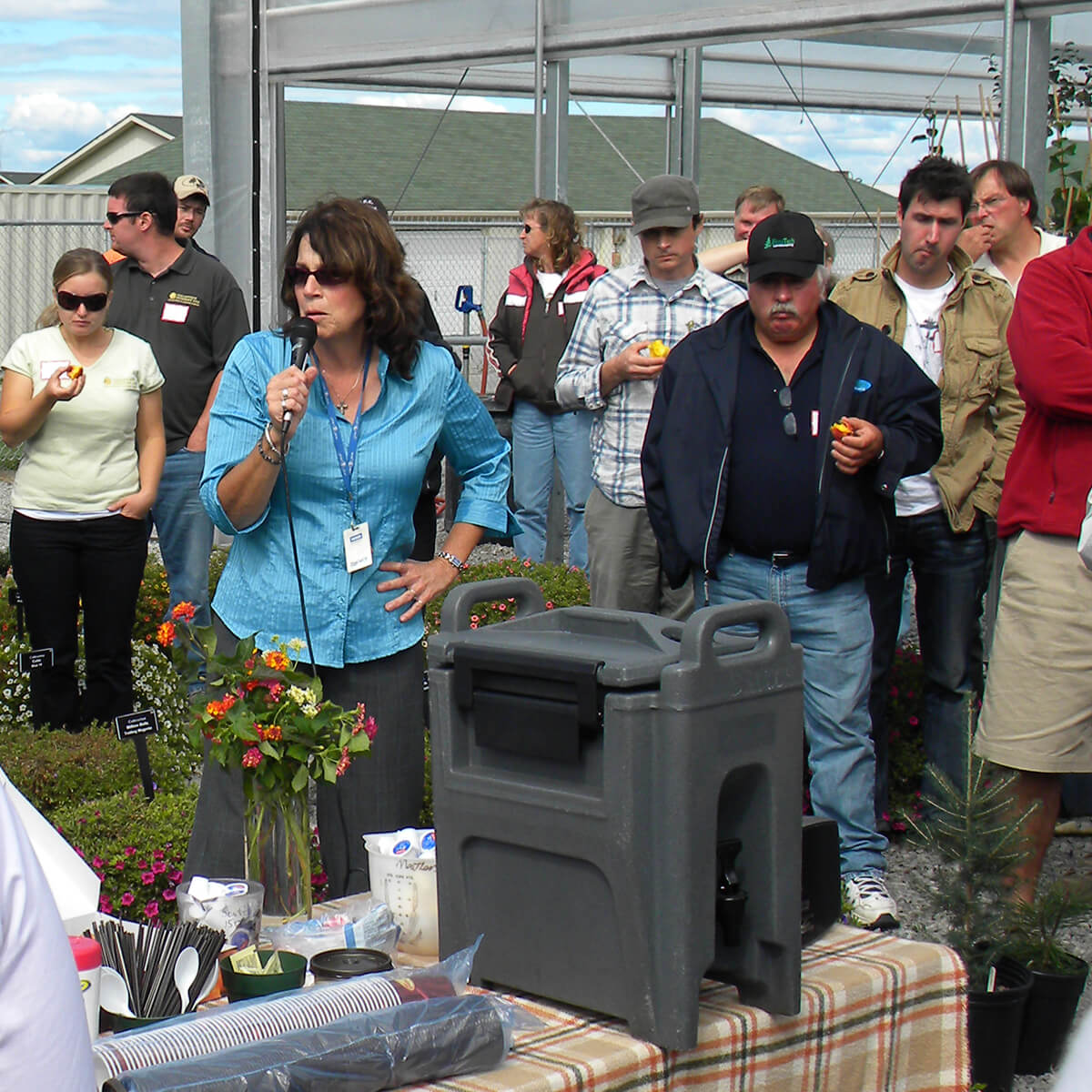 lady speaking to a crowd