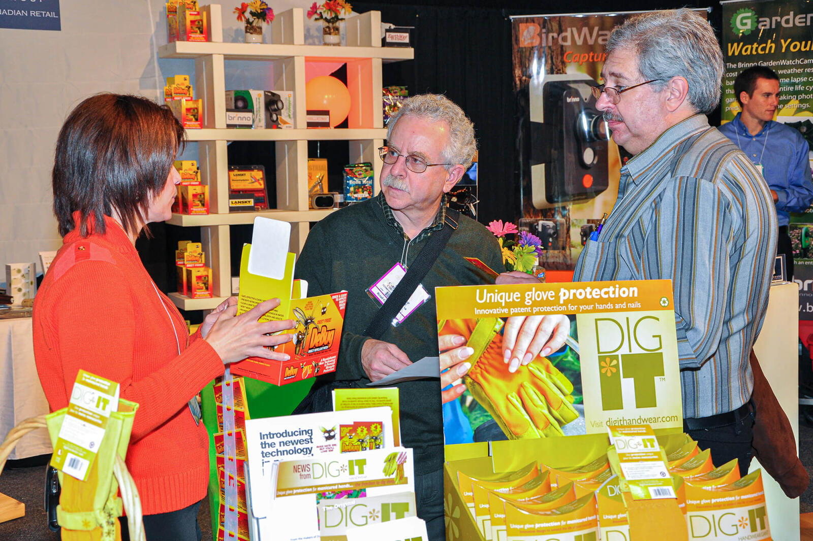 woman displaying product at a trade show