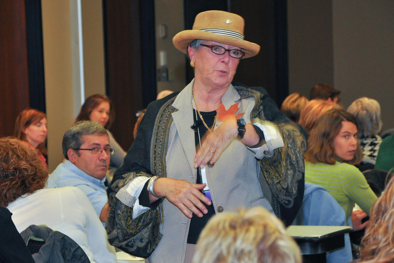 woman speaking to a crowd