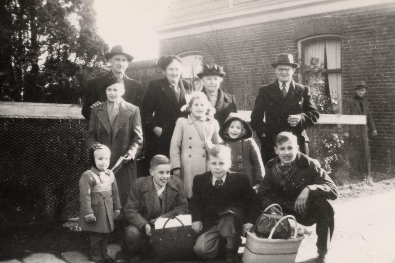 old photo of a family outside